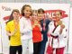 Schüler der Sportschule Park aus Stuttgart mit Medaillen bei einem Taekwondo-Poomsae-Turnier in Nürnberg.